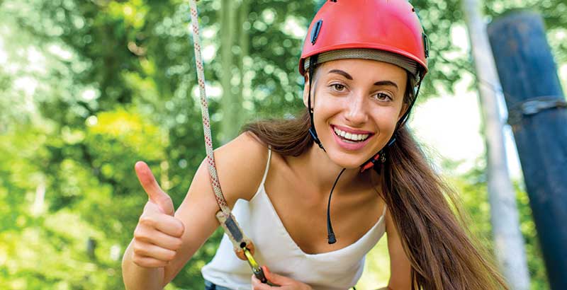 Woman ready to use the zip line at Red Mountain Park