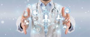 pic- Abstract of a network of Healthcare icons floating between a doctor's hands